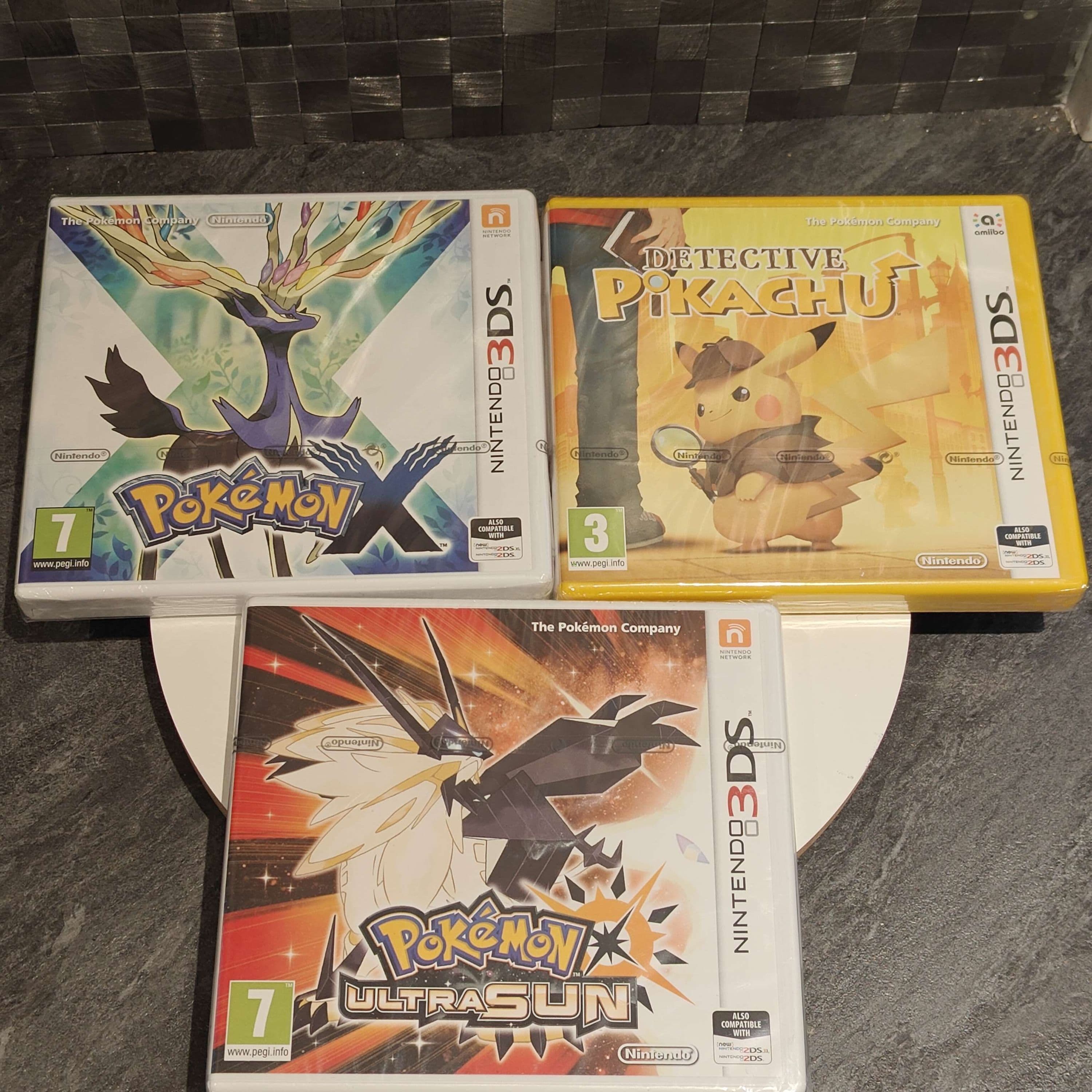 Three factory-sealed Pokémon games in original shrinkwrap